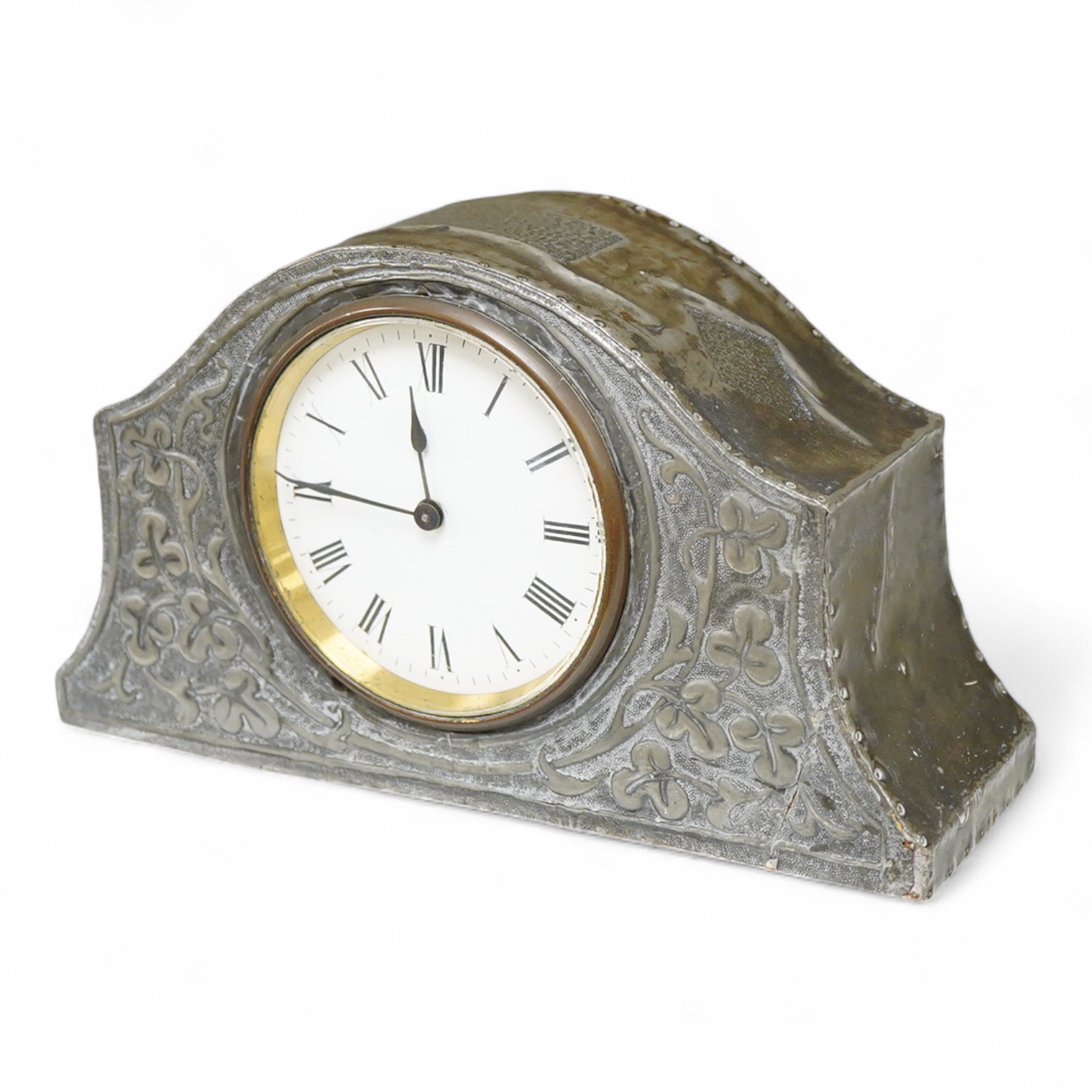 A pewter mantel timepiece with key, 22cm wide